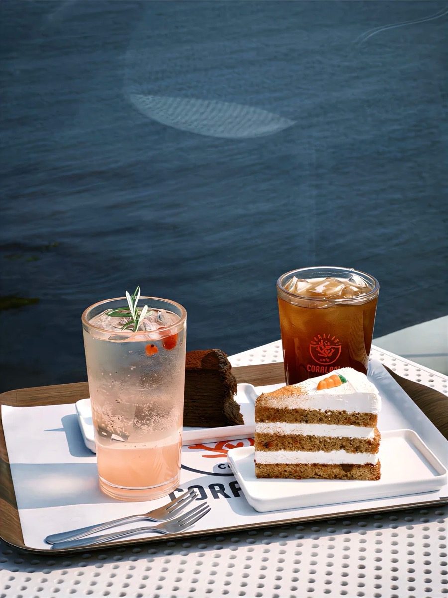 Cafe drinks and cake tray shot with FXNR film look